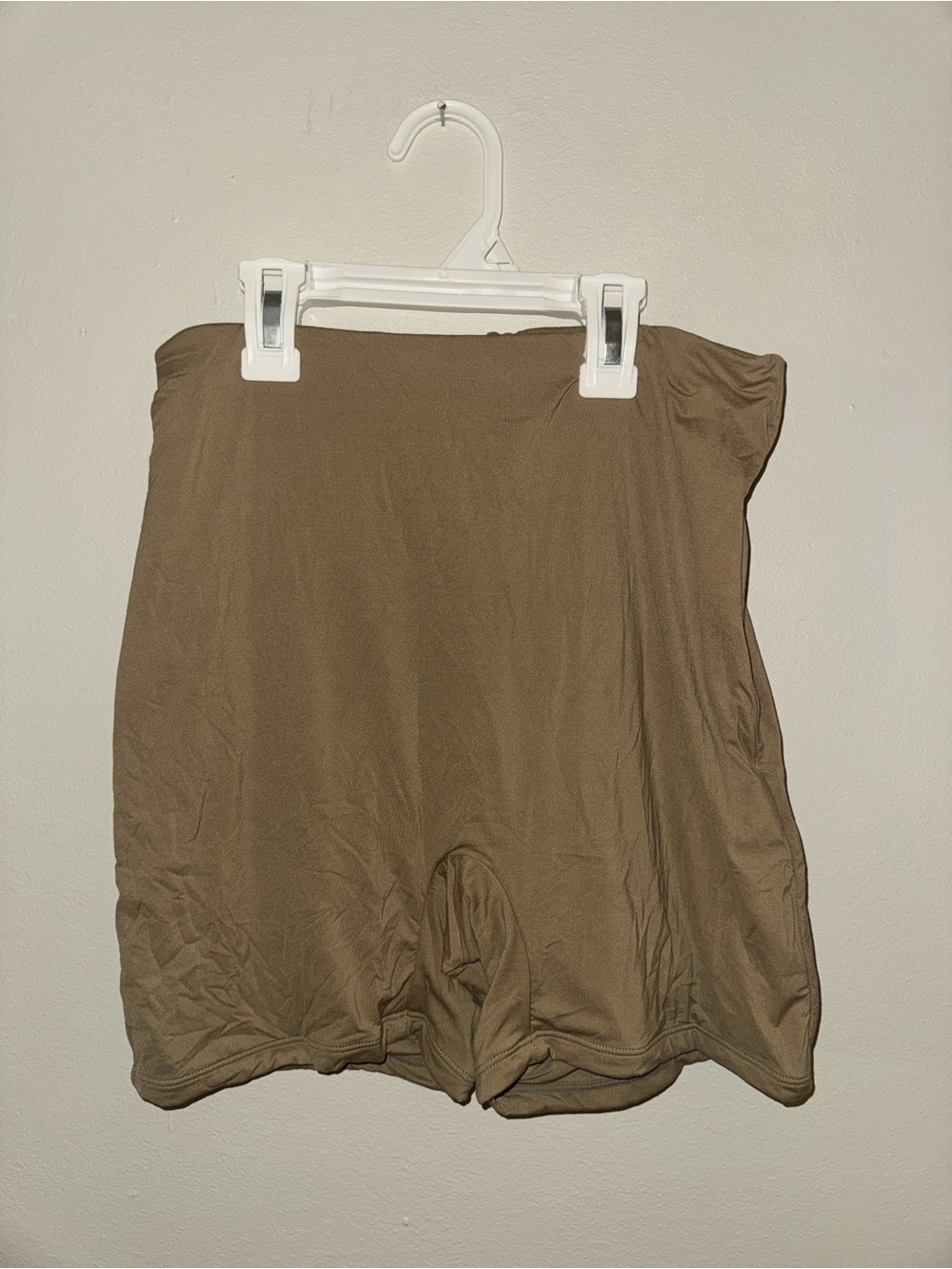 Never worn, tan seamless shorts, size medium